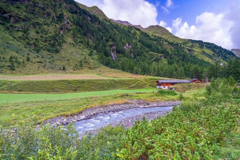 Stream with alpine hut in Dorfertal, Kalser Tauern, Hohe Tauern National Park, Kals am