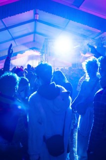 Dancing people at an atmospheric party with blue light effects, carnival, Schlagerkuchen Donzdorf,