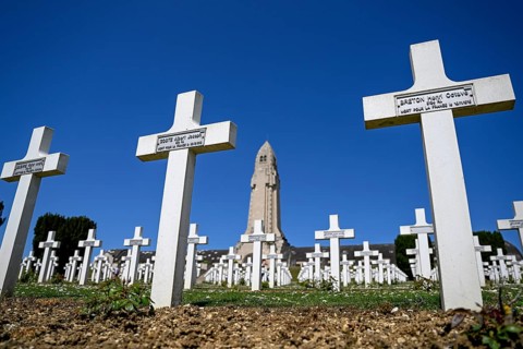 Cemetery of soldiers killed in the First World War, in the background the ossuary of Douaumont,