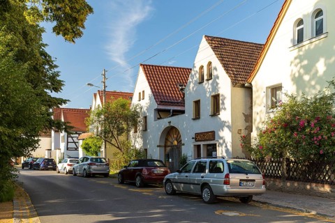 Village view of Naundorf, historic buildings with farmhouses, village green, Radebeul, Saxony,