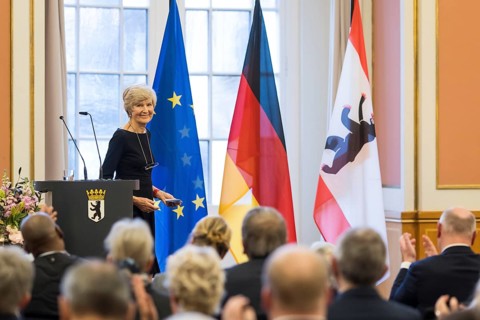 Friede Springer gives a speech of thanks after being awarded honorary citizenship at the Rotes