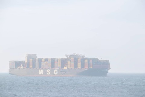 Container ship, containership MSC Claude Girardet from Mediterranean Shipping sailing with