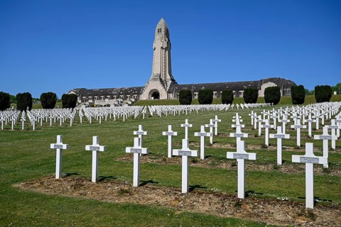 Cemetery of soldiers killed in the First World War, in the background the ossuary of Douaumont,