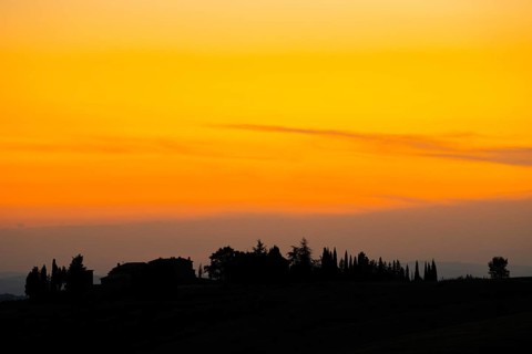 Tuscan landscape with fields and hills at sunset, Unesco world heritage, Pienza, Val d'Orcia,