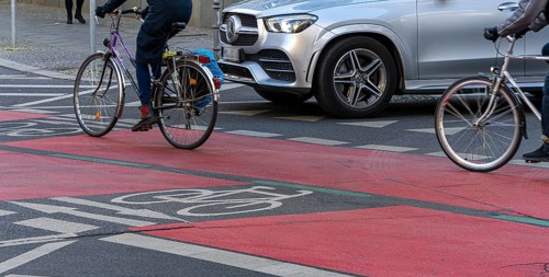 Red marked cycle path in the city centre, Berlin, Germany, Europe