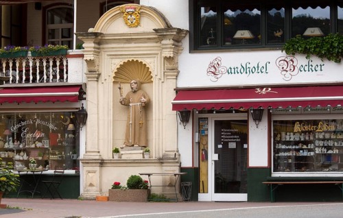 Souvenir shops and statue of St Francis, St, Saint, Saint