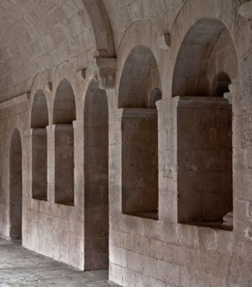 Cistercian monastery founded in 1148, cloister north wing, gate and window of the chapter house at