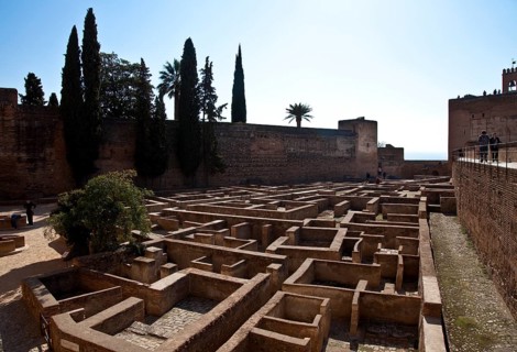 Alcazaba fortress, inner courtyard with Torre de la Vela, building floor plans exposed below