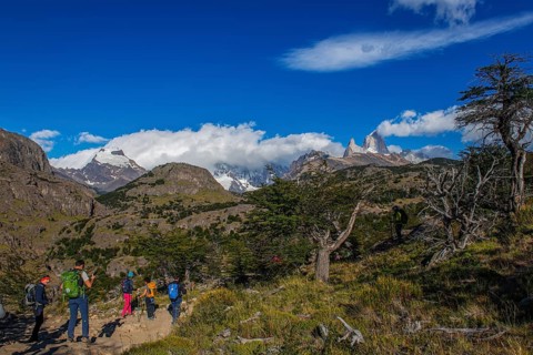 Trekkers at Cascada Martin with a view of the Fitzroy Massif, El Chaltén, Los Glaciares National