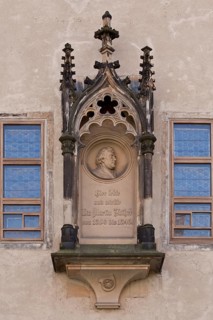 Tracery canopy on the outside between the windows of the Luther Room, containing a medallion with a
