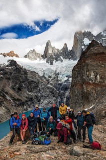 Climbing group in front of Laguna de los Tres with a view of the summit of Fitzroy, El Chaltén, Los