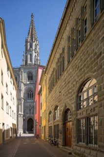 Constance, Minster, view from Katzgasse to the west façade and tower. Right House Zur Katz, former
