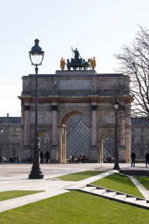 Arc de Triomphe du Carrousel and inner courtyard of the Louvre with pyramid by Ieoh Ming Pei, view