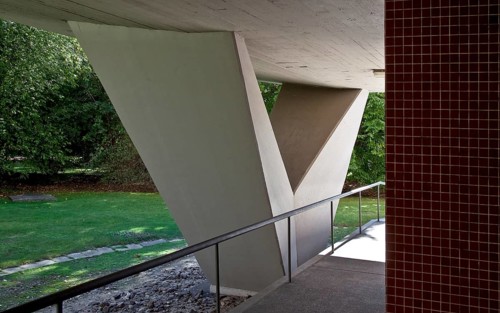 Built in 1957 for INTERBAU, structure supported on sloping columns on the ground floor, sloping