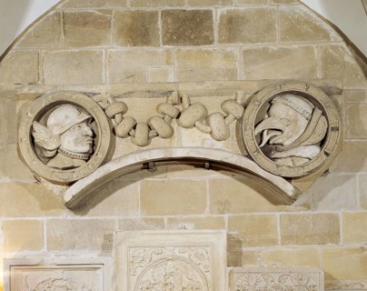 Stone medallions from the tower superstructure, on the right monk with forked tongue, St., Sankt,