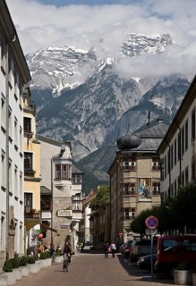 Austrian Hall in Tyrol. Schulgasse with the Karwendel mountains in the background