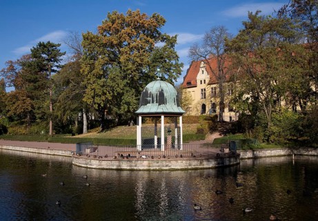View across the pond to the pond arbour and castle