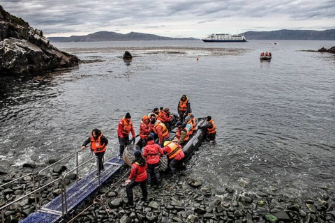 Visitors land on Cape Horn, Cabo de Hornos National Park, southernmost point of South America,