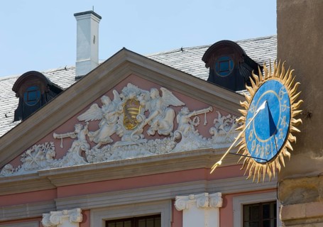 Castle courtyard, sundial and baroque pediment