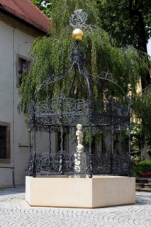 Grüner Born fountain in front of the monastery, created in 1679 by the Zittau blacksmith Michael