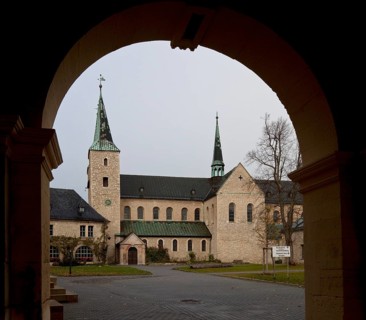 Monastery church seen from the south through the gatehouse, St., Sankt, Saint