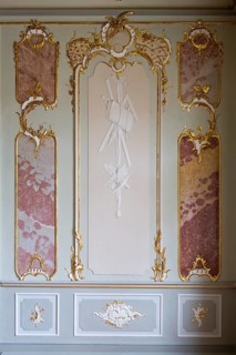 Rococo hall, stucco detail, allegory of the arts
