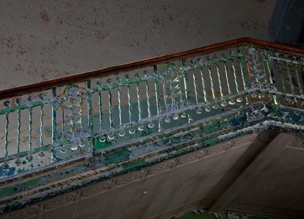 Pavilion for men, staircase railing detail with peeling paint