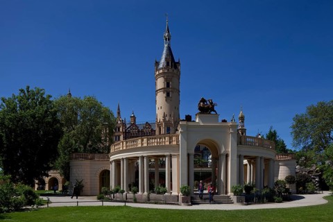 Orangery in front around 1850 by F. A. Stüler, main tower above