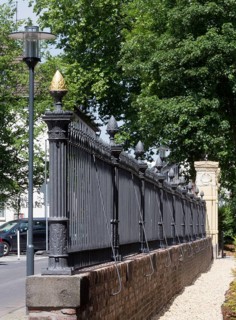 Restored wall and Tor tor to the park, golden pine cone