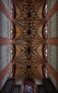 Former Cistercian church, central nave vault, western part, organ and west window cut at the