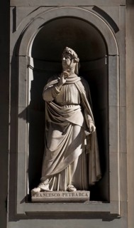 Sculpture by Francesco Petrarca on the façade