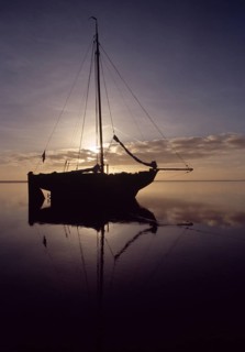 Wadden Sea, natural landscape. Sailing ship fell dry