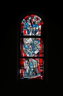 Stained glass window by Ernst Jansen-Winkeln in the right (west) aisle, scenes from the life of St