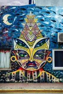 Mural with indigenous artwork of the natives, harbour of Ushuaia, Argentina, South America