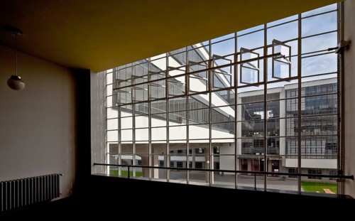 View through the stairwell window of the former vocational school between the ground floor and