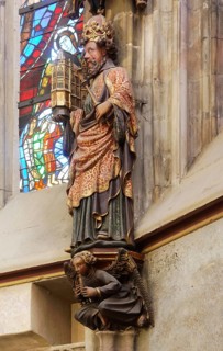 Choir hall, figure of Charlemagne on the eastern end wall with model of the cathedral