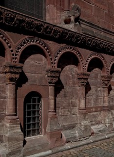 Base area at the choir with Romanesque arcade and elephant sculpture, St., Sankt, Saint