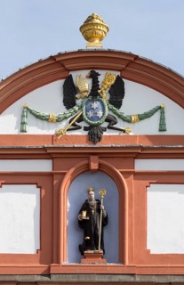 Prelature, bishop's figure above the outer portal
