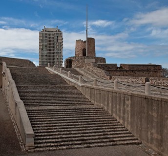 Staircase and ramp to the town, battery tower and modern tower block above