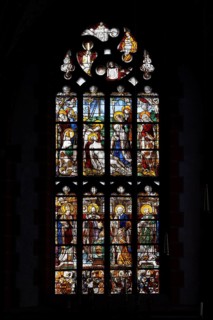 Renaissance window from 1535 on the end wall of the south aisle: Lamentation, below which the donor
