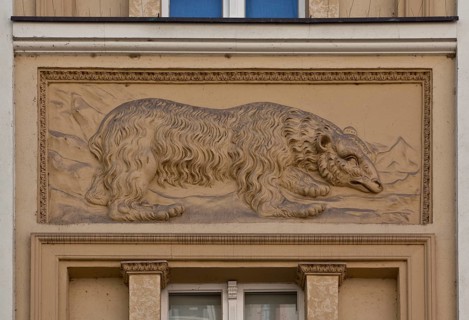 Stucco relief of a bear, relief possibly early modern, façade ca. mid-19th cent