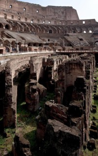 Interior with wall remains below the former arena
