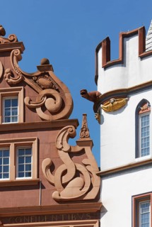 Left: so-called Red House, representative late Renaissance building, two-storey volute gable. The