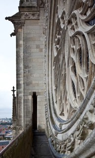 Start of construction 1220, rose window of the west façade, partial view of the connecting corridor