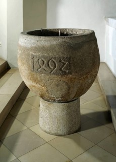 Baptismal font from 1492, heavily reworked