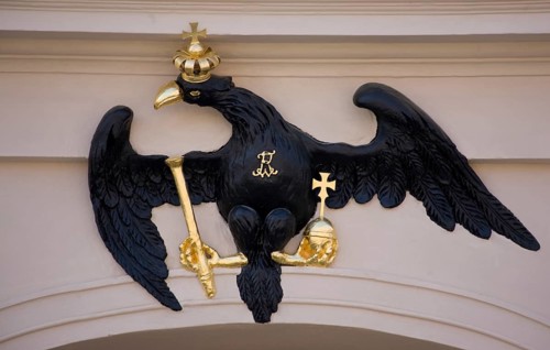 Heraldic animal with crown, sceptre and orb