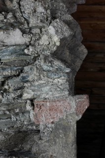 Above the choir vault, wall above the choir arch, remnant of a Romanesque window Church of St.,
