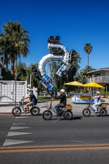 Cyclist in front of truck artwork, Fergusons Motel, Las Vegas, Nevada, USA, North America