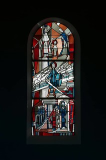 Stained glass window by Ernst Jansen-Winkeln in the left (eastern) aisle, scenes from the life of