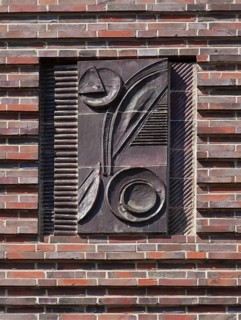 Halle, ceramic relief on the façade of a residential building. Halle S Albert-Ebert-Strasse 61-65